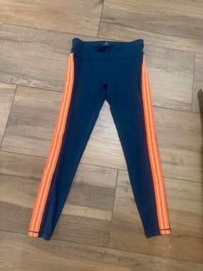 Sweaty Betty - worn inc - size small navy leggings w/Bright Orange Side Stripes
